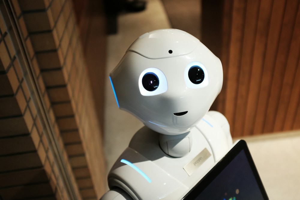 Humanoid robot in a technical workspace